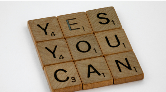 scrabble tiles that has the quote yes you can
