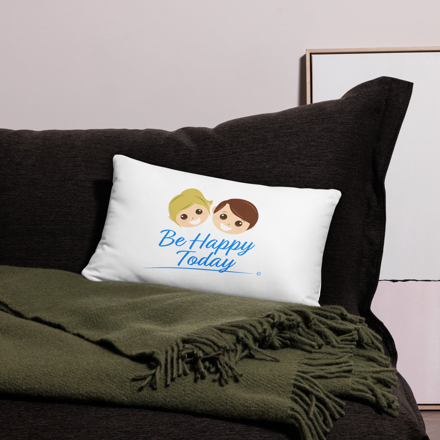 Modern 20x12 pillow adorned with the positive message 'Be Happy Today,' creating a happy atmosphere on a black bed with a vibrant green scarf.