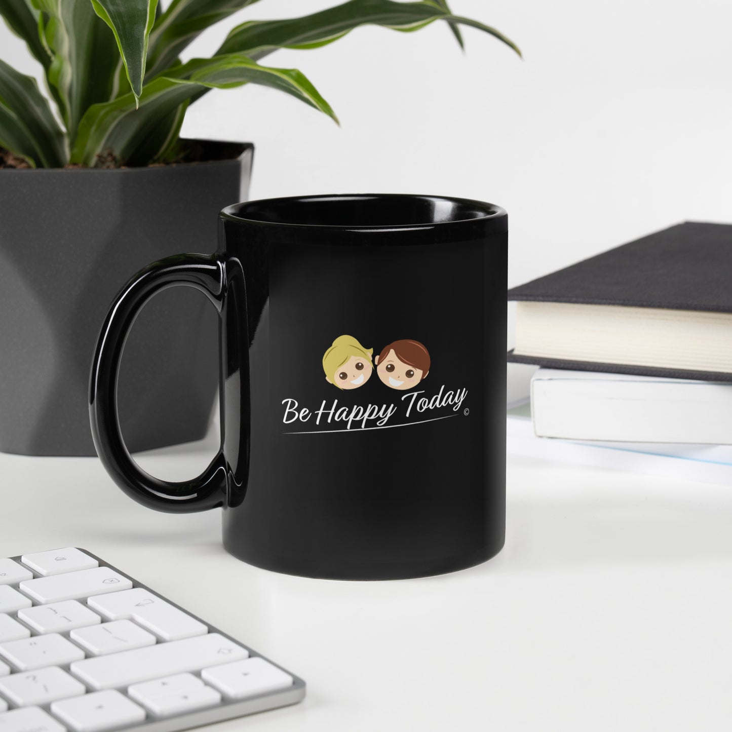 Black glossy coffee cup with a saying Be Happy today
