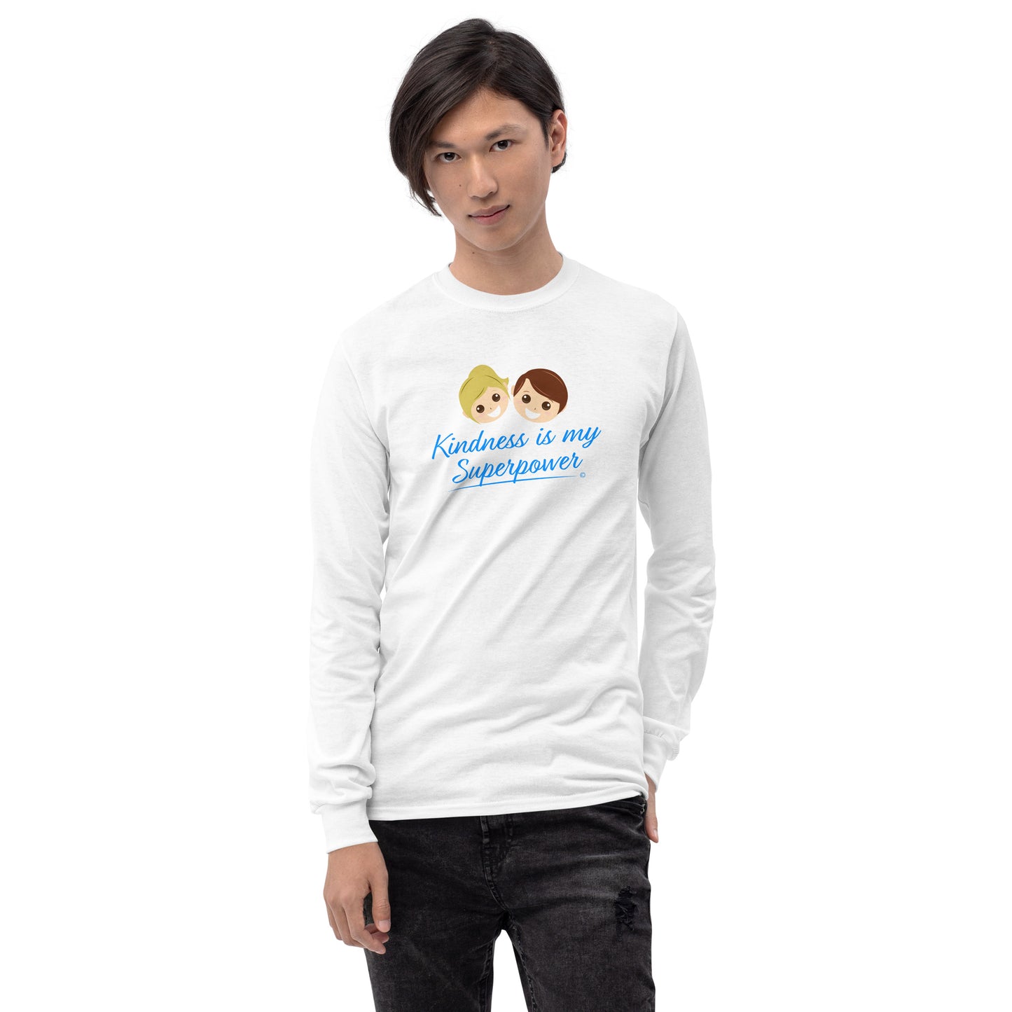A confident young man wearing a stylish long sleeve shirt in white, featuring the empowering quote 'Kindness is my Superpower' in bold lettering.