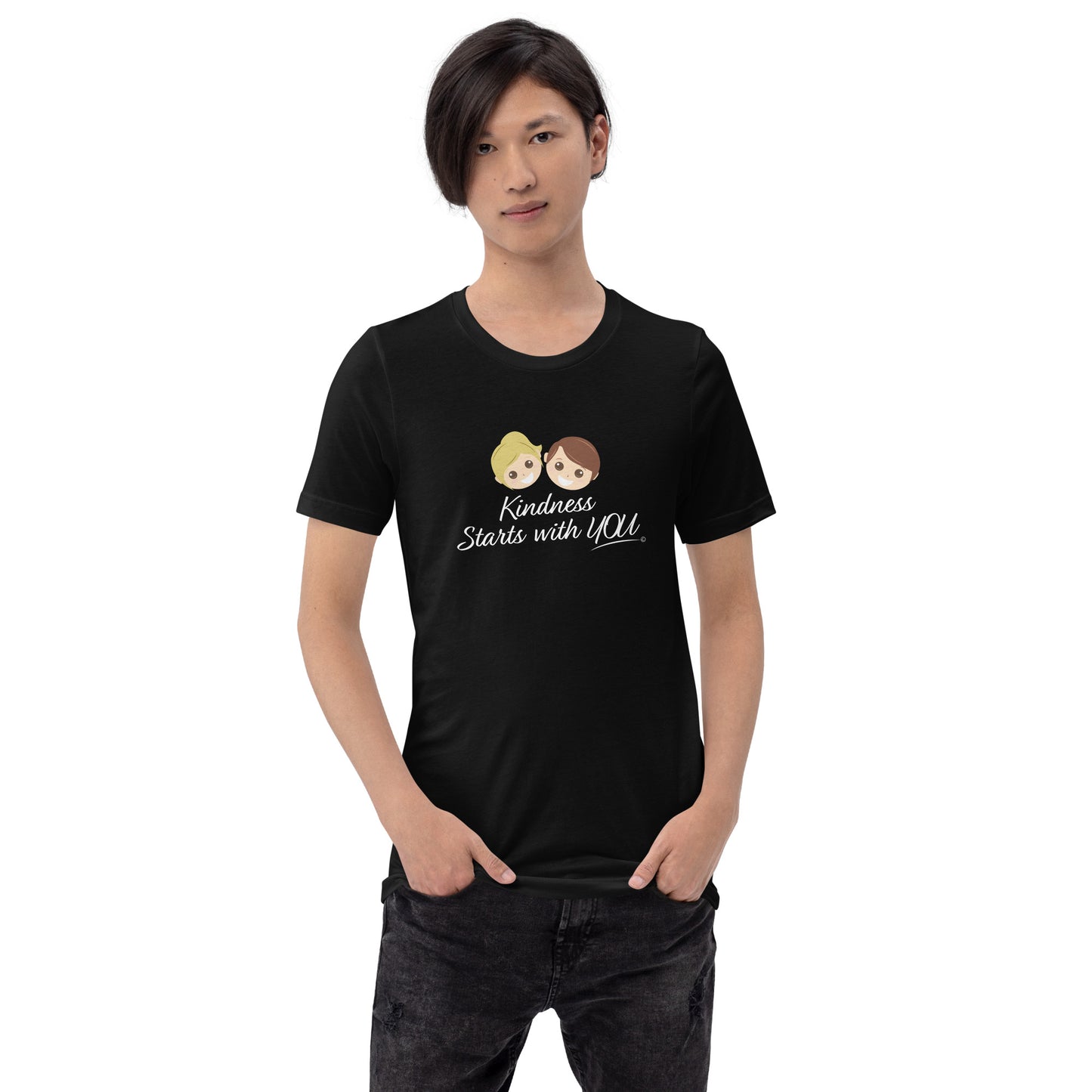 A confident young man proudly modeling a versatile black unisex t-shirt with the inspiring quote 'Kindness Starts with You' in bold lettering.