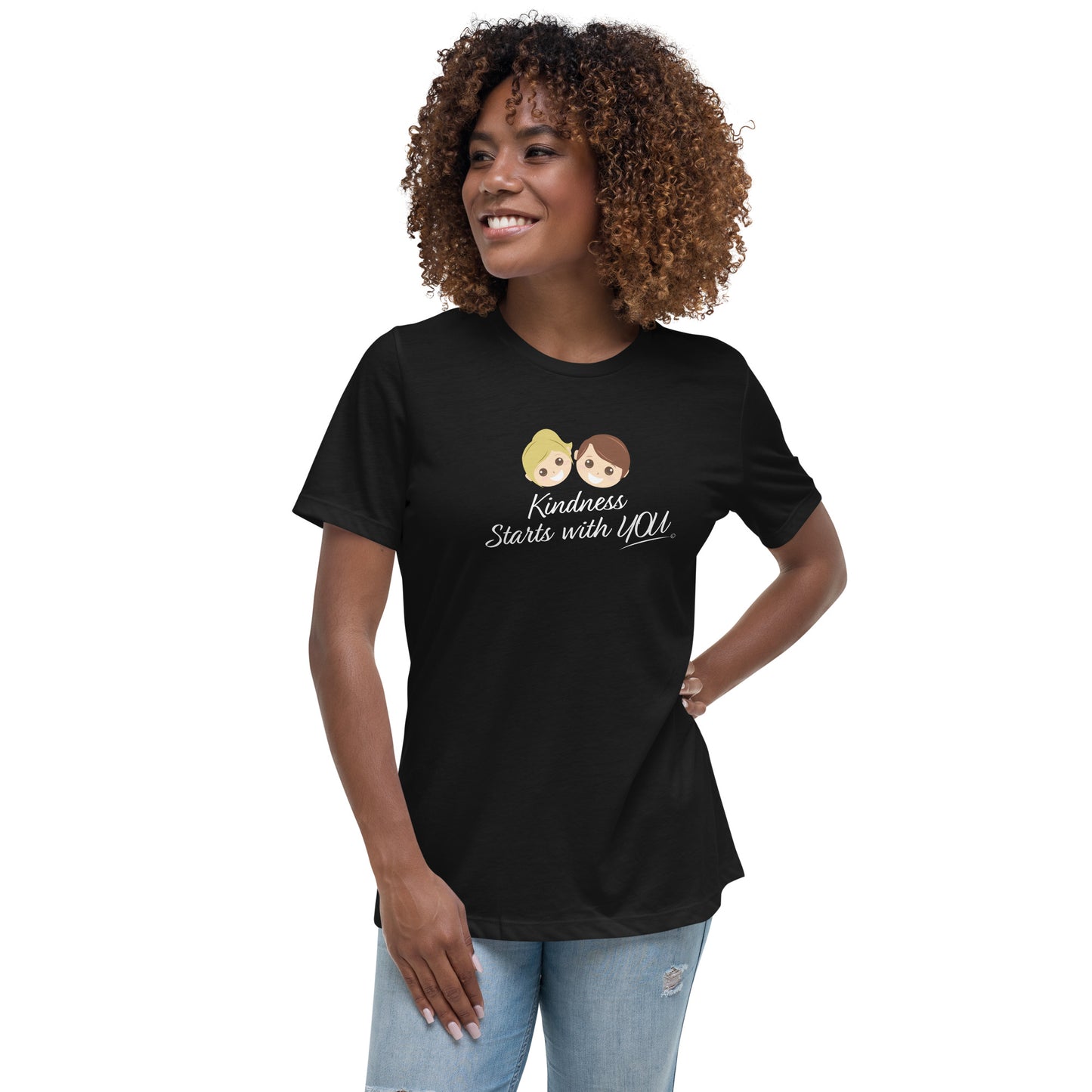 A confident woman showcasing a stylish women's shirt in black, featuring the empowering quote 'Kindness Starts with You' in bold lettering.