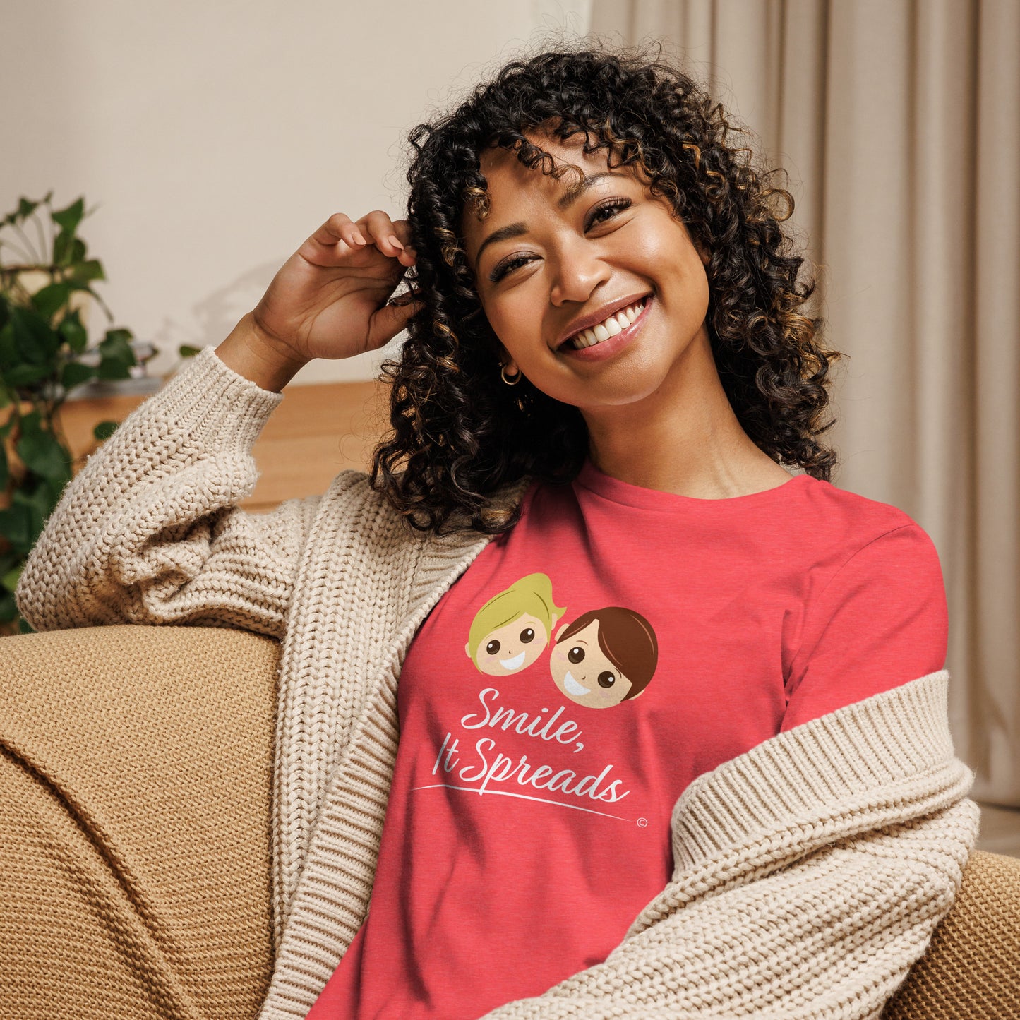 Smile, It Spreads Women's Tees